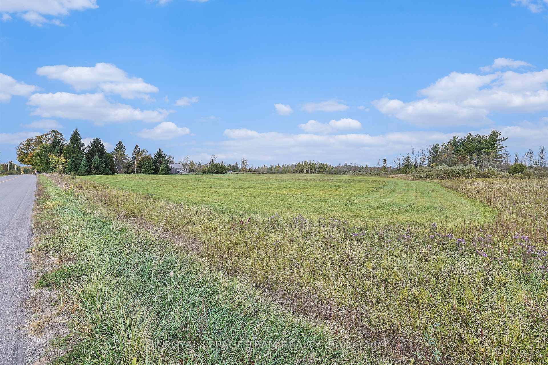 40 Acres of pristine wilderness with paved country road access.