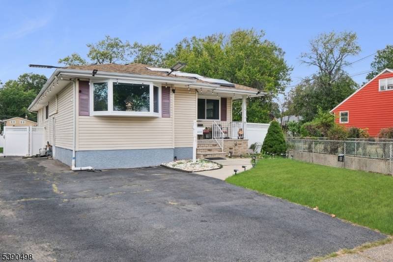 Welcome to this beautifully updated expanded ranch that perfectly blends comfort, elegance, and modern efficiency.