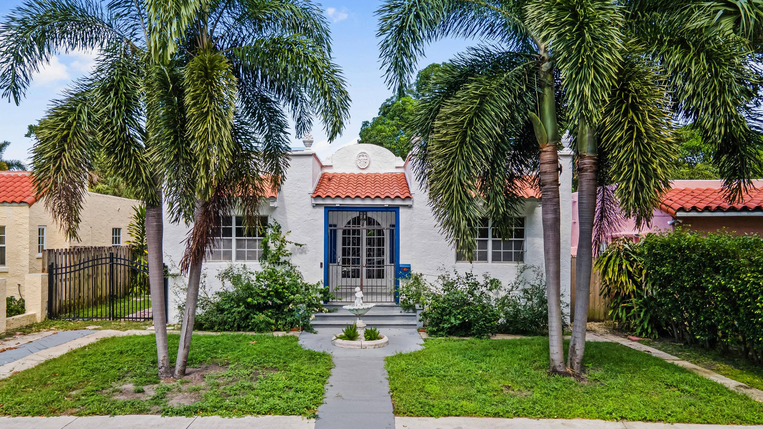 Historic century old house with separate Guest house, and heated pool plus spa, in brick paver courtyard.