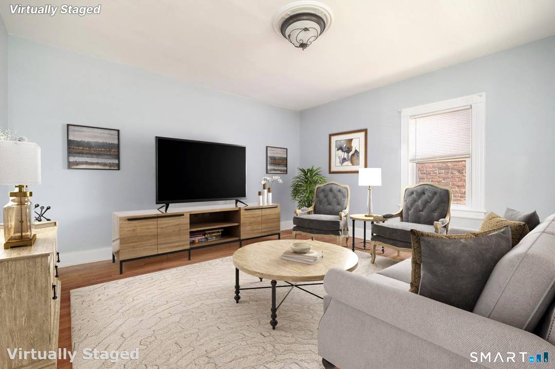 Charming 1900 Westside Colonial blending timeless character with thoughtful updates.