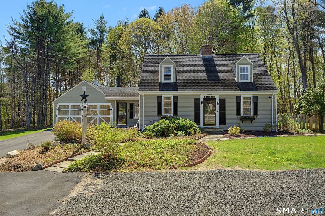 Nestled on a private, picturesque setting, welcome to this expanded and beautifully maintained Cape set on 2.