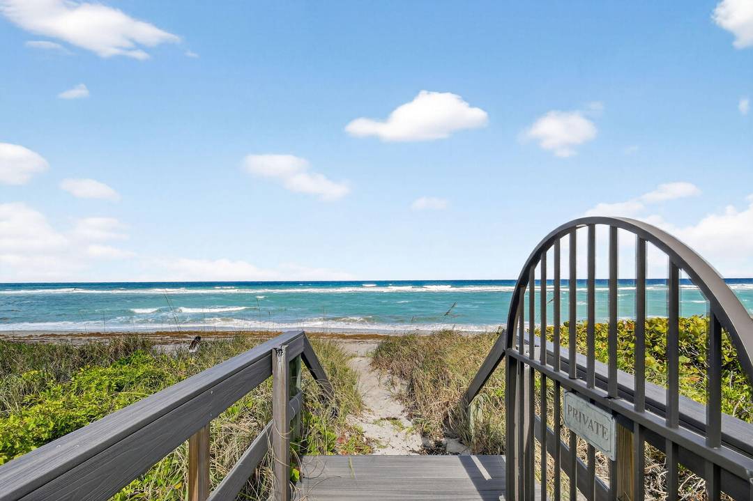 Light, bright, airy, and just 224 steps from the front door to the beach !
