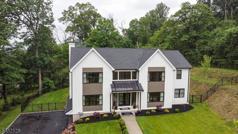 STUNNING Custom Home with luxury finishes, exceptional entertaining spaces peaceful treetop views in the Watchung Mountains !