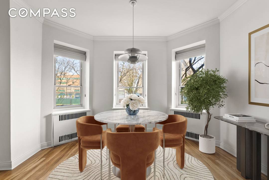 Welcome to this expansive, impeccably updated alcove studio easily convertible into a junior one bedroom where refined design meets serene living.