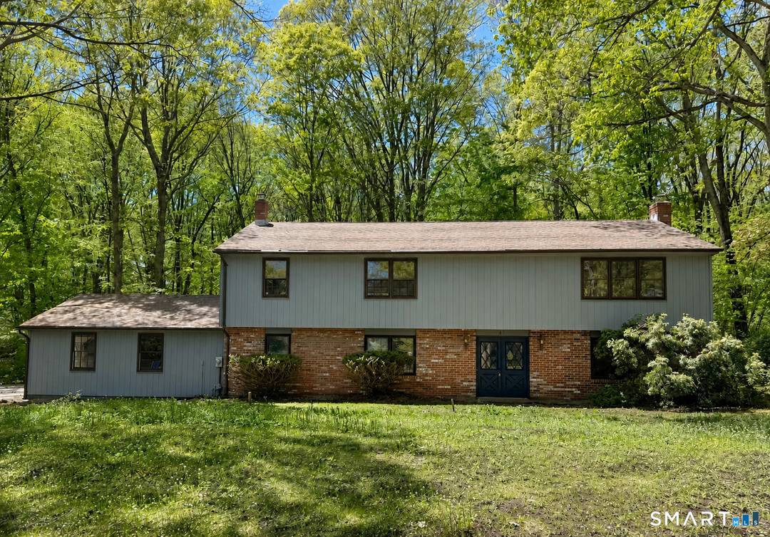 Set on a quiet cul de sac in the beautiful Meadow Hills Lake community, this four bedroom, three bath home on.
