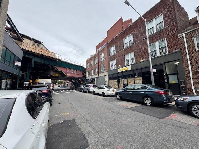 Heart Of Woodside, One Short Block Away from 7 Train, This Solid Brick Mix Use Building Has 1 Commercial Store amp ; 2x Two Bedrooms Apartments on top, Finished Basement, ...