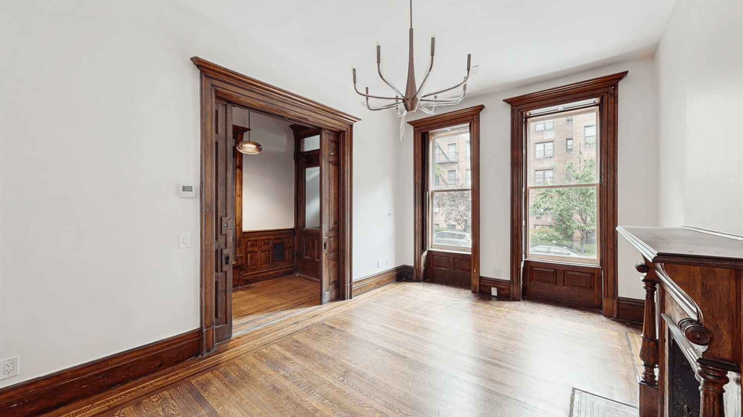 Welcome to this beautifully restored townhouse triplex rental at 414 West 149th Street in the heart of Hamilton Heights, offering the perfect blend of historic charm and modern luxury.