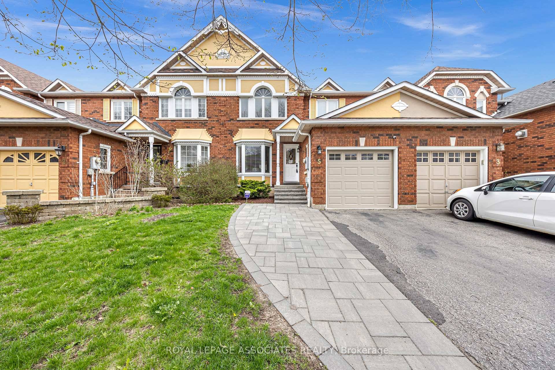Stunning John Boddy Built Freehold Townhome Nestled in the Desirable Riverside Community !