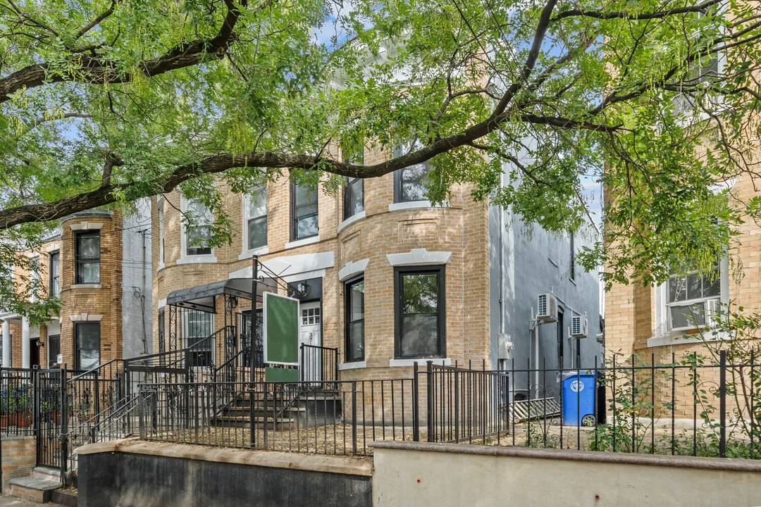 371 Grant Avenue is a fully renovated brick townhouse on a quiet, tree lined street at the Cypress Hills City Line border.