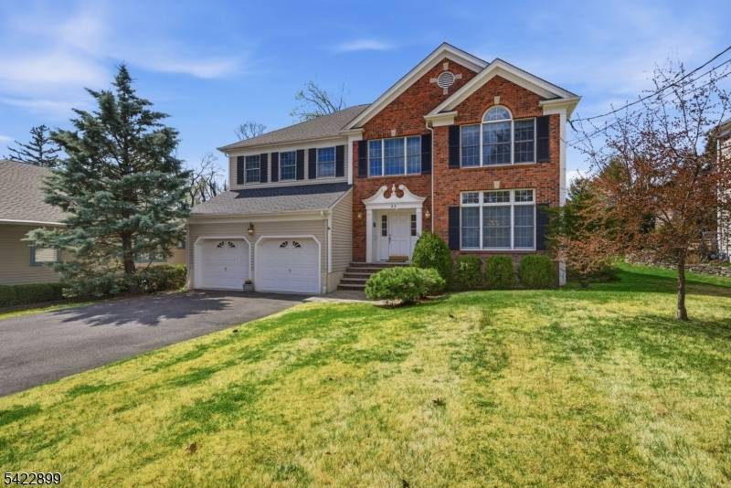 Welcome to this beautifully maintained Madison colonial, ideally located on a quiet street just steps from vibrant downtown Madison, train stations, and highly sought after schools.