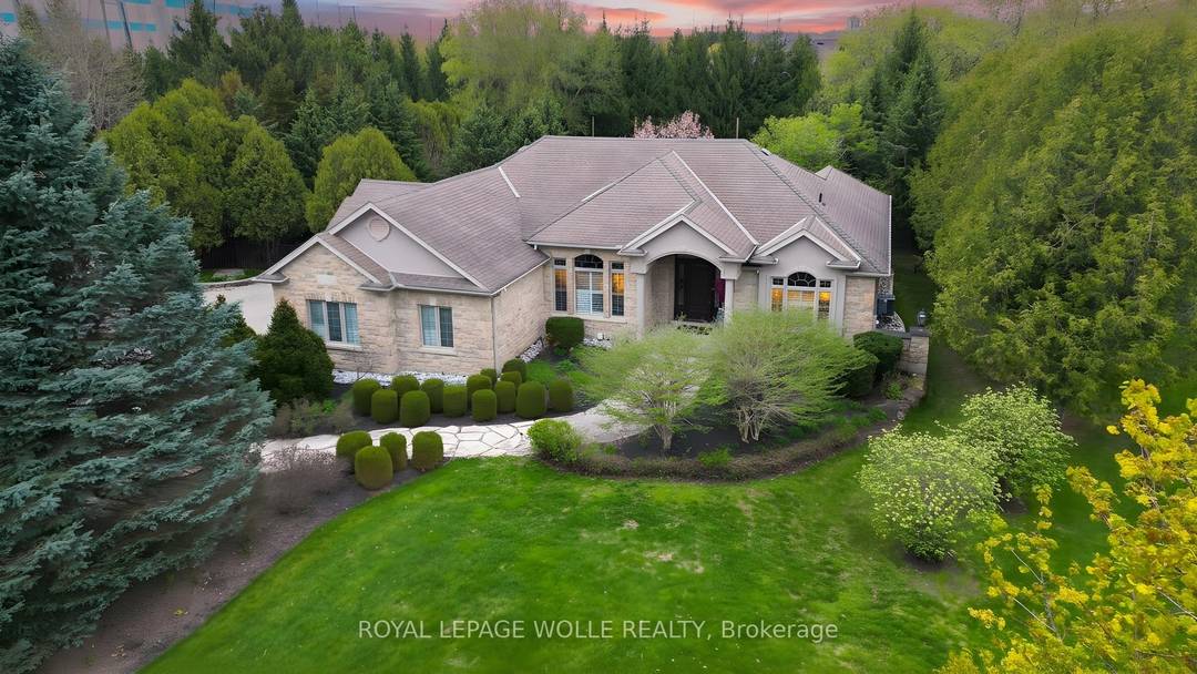 Discover a MASTERFULLY crafted CUSTOM built STONE BUNGALOW in the historic community of Blair, offering over 4, 200 square feet of refined living space just minutes from the 401.