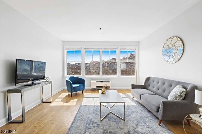 Residence 409 is a top floor 818 SF 1 bedroom 1 bathroom with in residence laundry, an abundance of storage and assigned parking.
