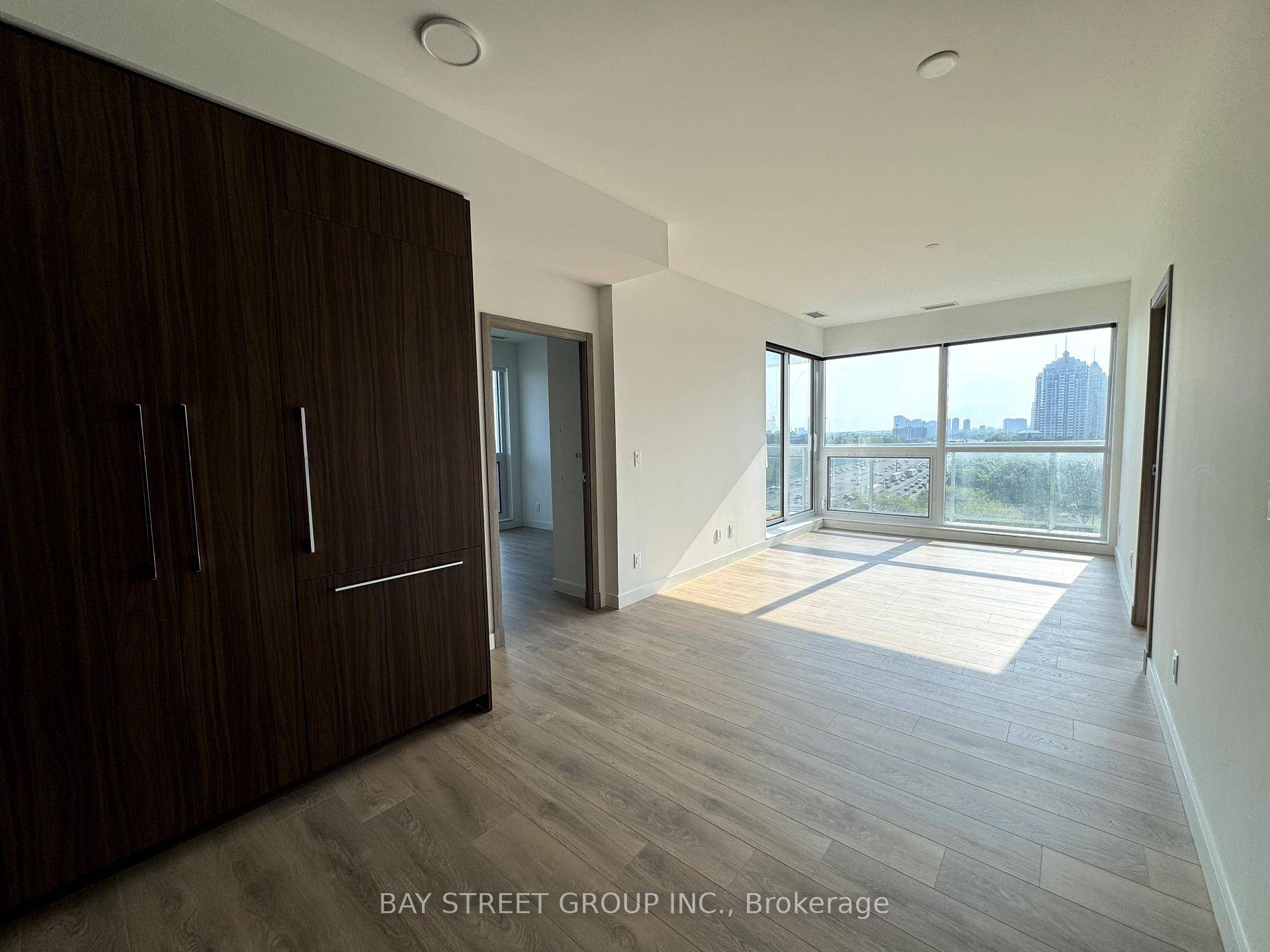 Welcome to Saisons at Concord Park Place, a luxury condo in North York offering a stunning southeast corner suite with breathtaking views of the CN Tower and Toronto skyline.