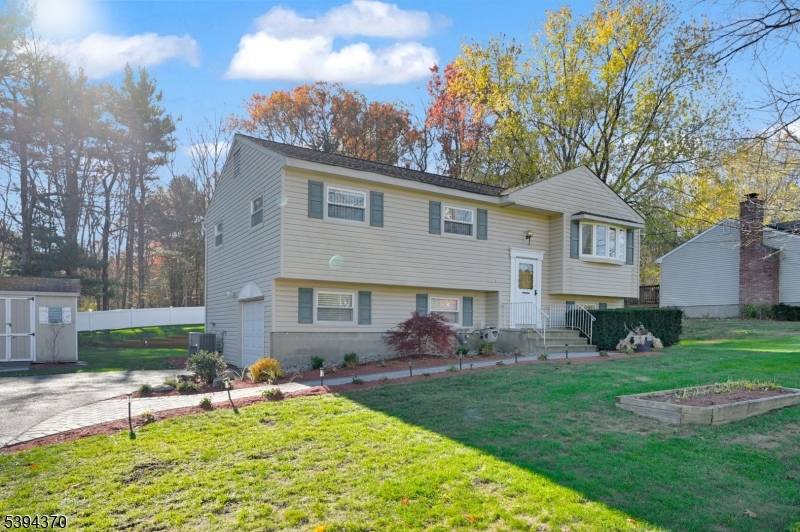 Welcome To This Gorgeous Bi Level Home In The Desirable Crescent Park Section in West Milford.