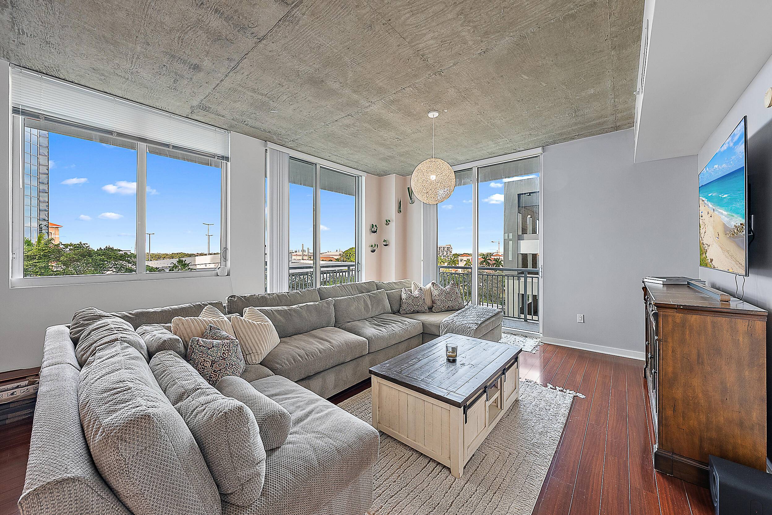 Immaculately maintained, this three bedroom, two bathroom corner unit offers an open layout with a spacious wraparound balcony, perfect for relaxing or entertaining.