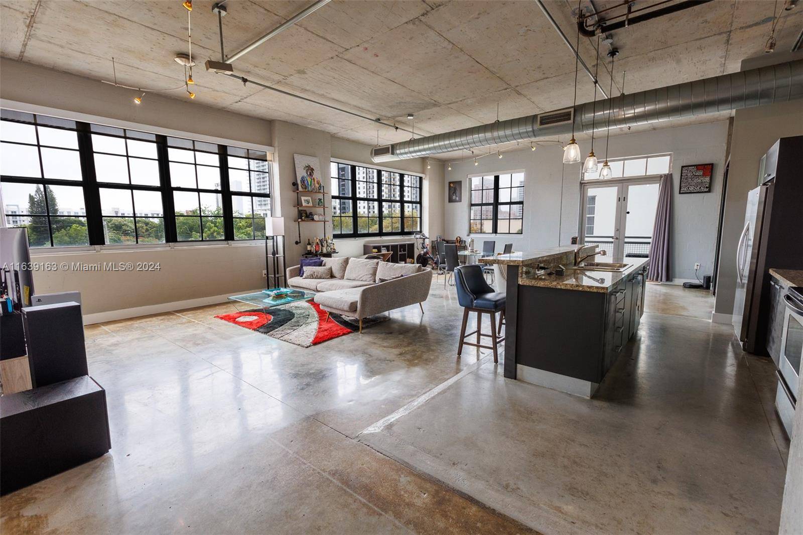 Explore a unique opportunity at Avenue Lofts with this one of a kind 2 bedroom, 2 bathroom corner loft.