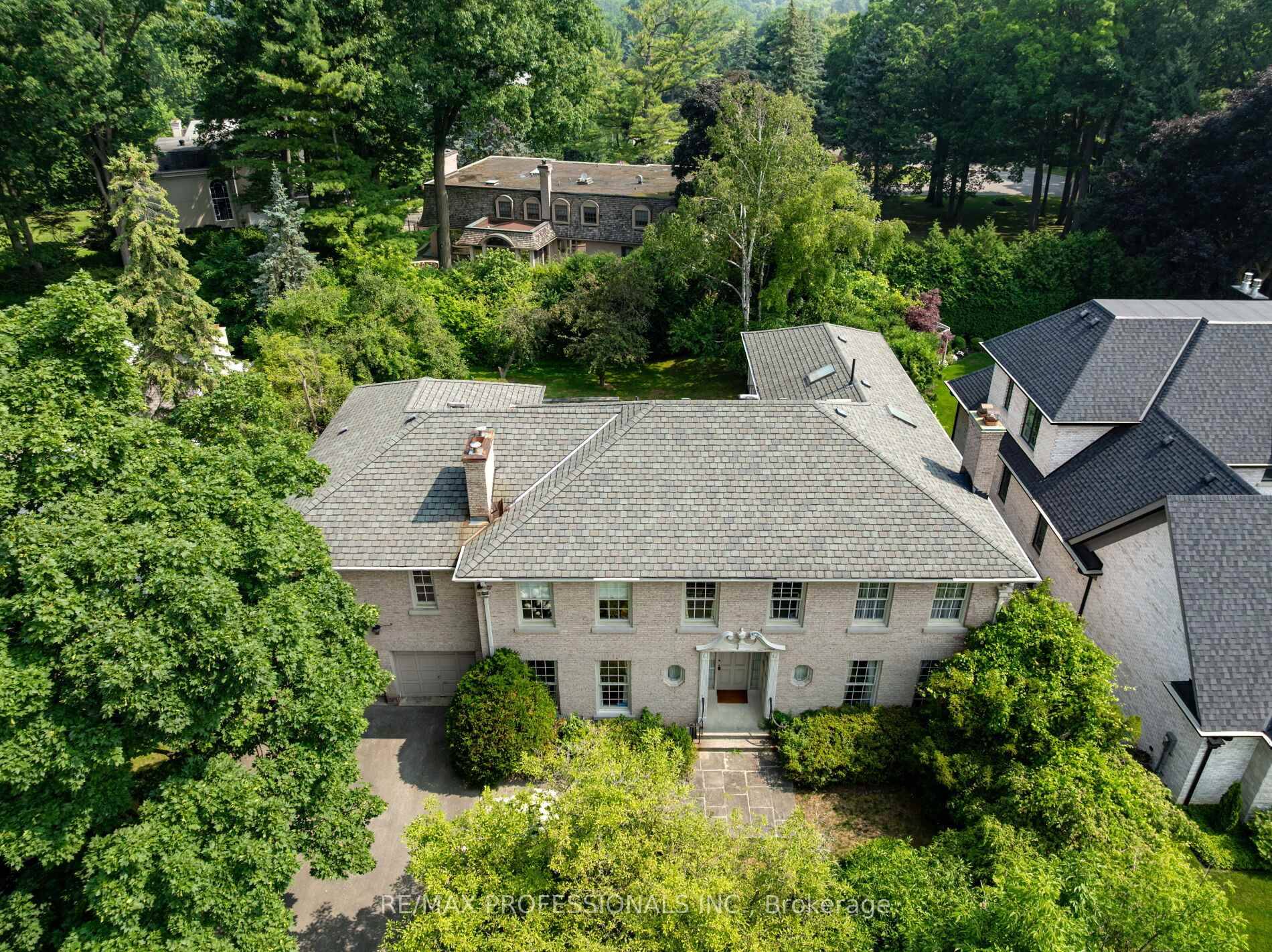 Rare opportunity to acquire ownership of a most significant lot and bespoke residence, on what is arguably the most prestigious court in Lincoln Woods.