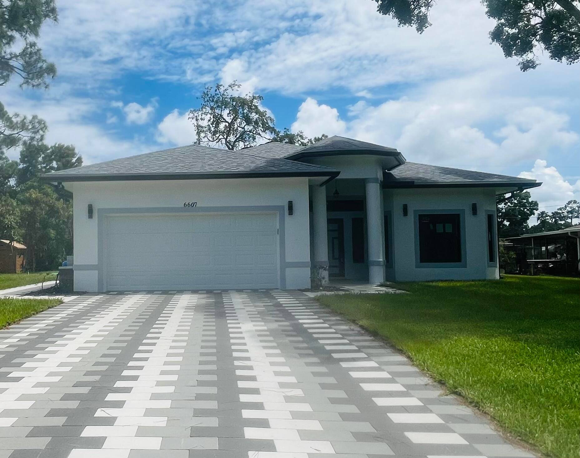 MUST SEE ! Beautiful, move in ready, 2024 brand new elegant 3 bedroom, 2 bathroom, 2 car garage, CBS home with hurricane proof impact windows and doors.