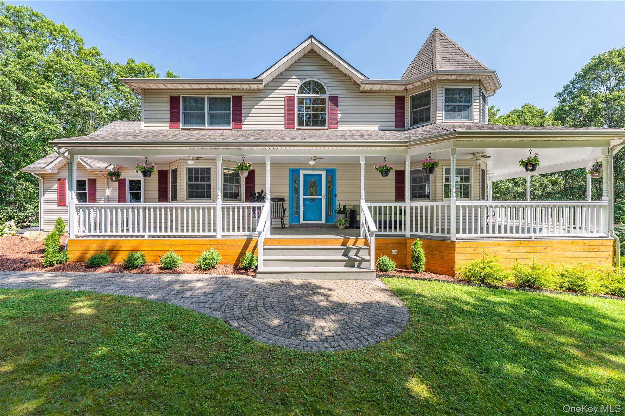 On a private road, at the end of a quiet cul de sac, 15 Douglas Lane offers timeless elegance, carefully curated updates, and rare privacy on 2.