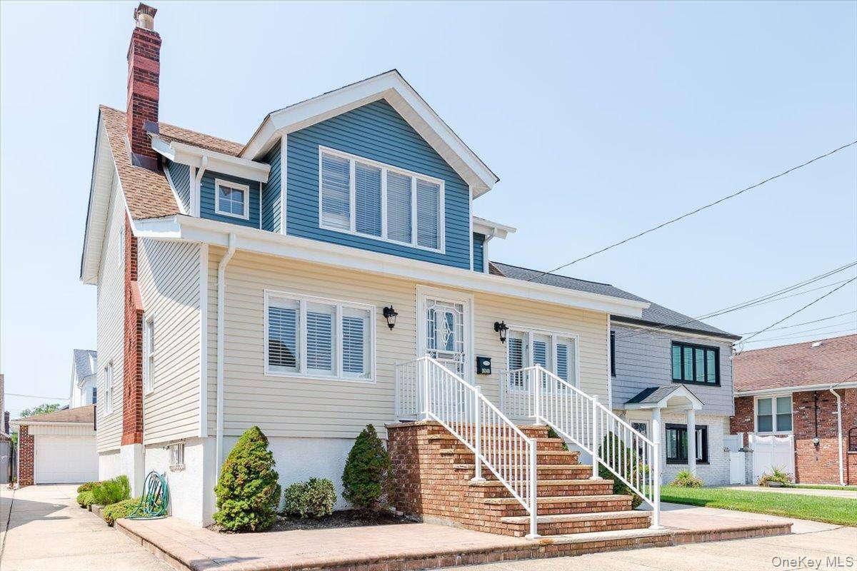 Welcome to your dream home nestled in the heart of Howard Beach.