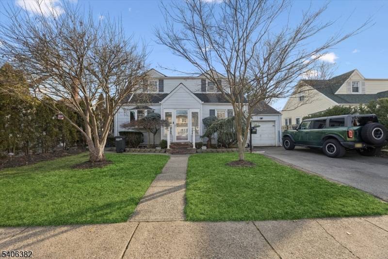 Cape Cod style home with tons of potential in desirable Fair Lawn.