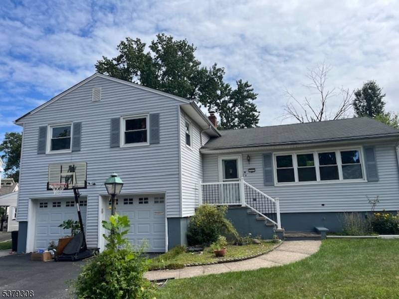 WELL LOCATED UNION. SPLIT LEVEL OPEN CONCEPT WITH LARGE ROOMS 3 BEDS, 2 1 2 BATHS WITH SPACIOUS 2 CAR GARAGE.