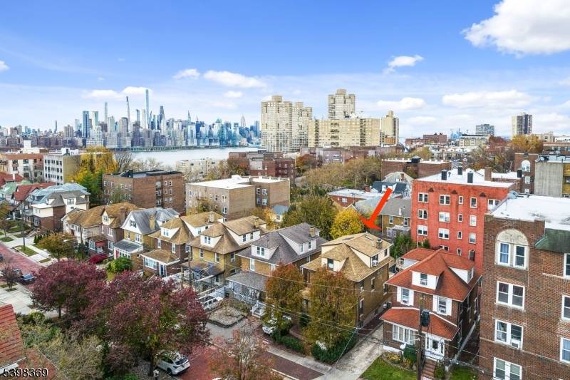 Perched just steps from Boulevard East on the cliffs above the Hudson River, this fully detached brick home offers rare space, charm, and convenience only minutes from Manhattan.