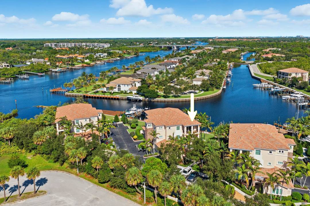 Luxury 3rd floor Penthouse in the sought after Waterfront gated community of Frenchman's Harbor with amazing Intracoastal Sunset views !