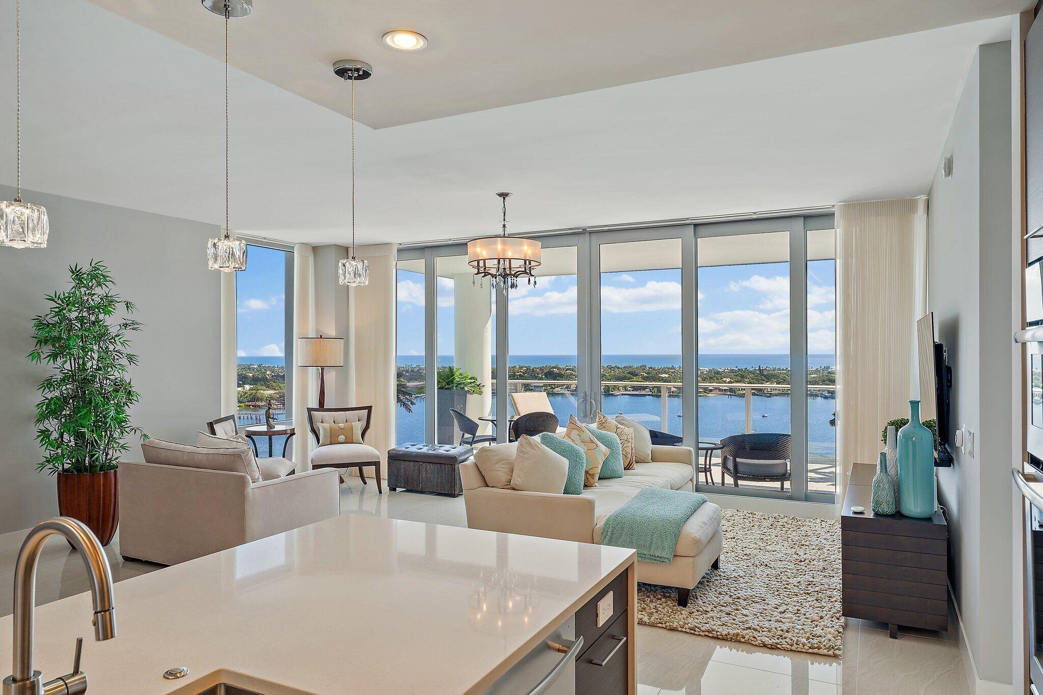 Enjoy amazing views to the ocean, Lake Worth Lagoon, and as far as they eye can see from this ultra luxury ''Azure'' floor plan in Water Club.