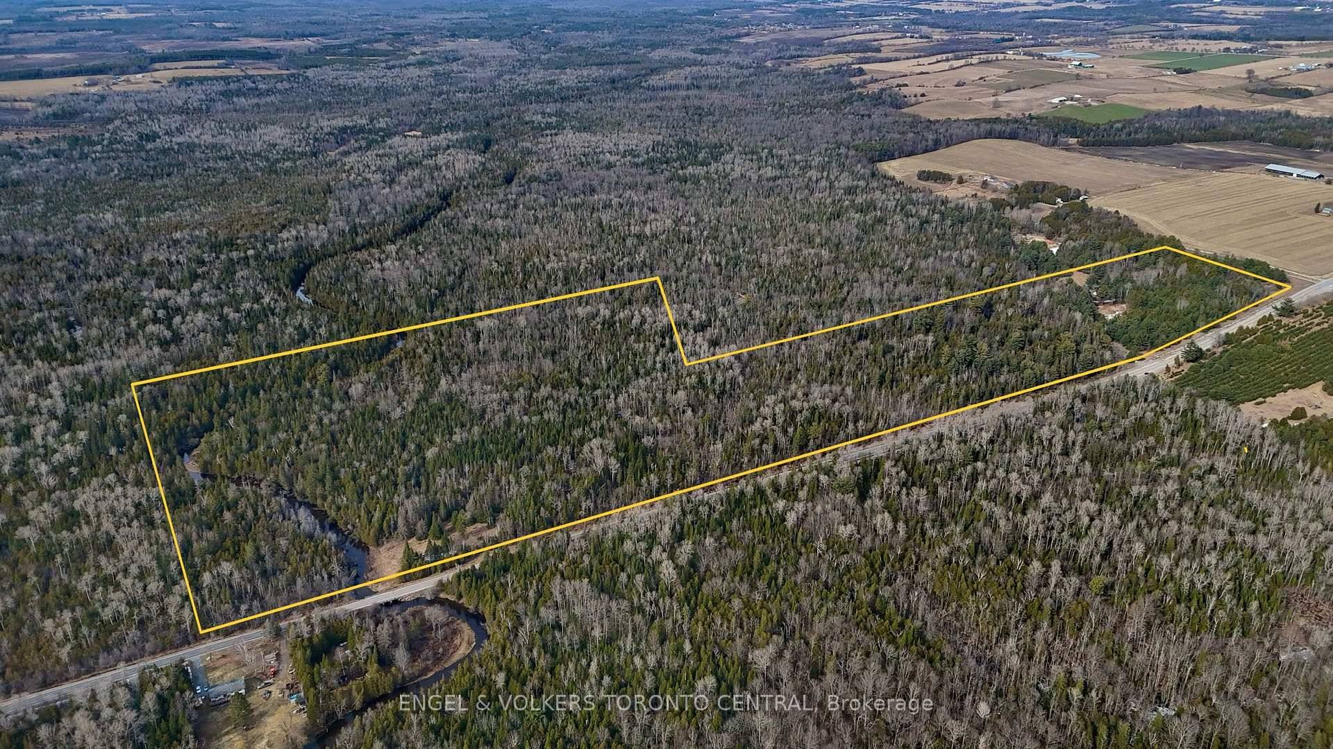 Welcome to this stunning 77 acre property nestled in a natural wooded setting, offering unparalleled privacy and tranquility.
