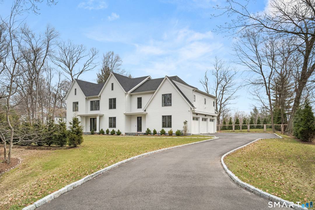 Stunning modern transitional home built by Compo Luxury Homes in 2024 and ideally located just minutes to downtown Westport, Compo Beach, and the train.