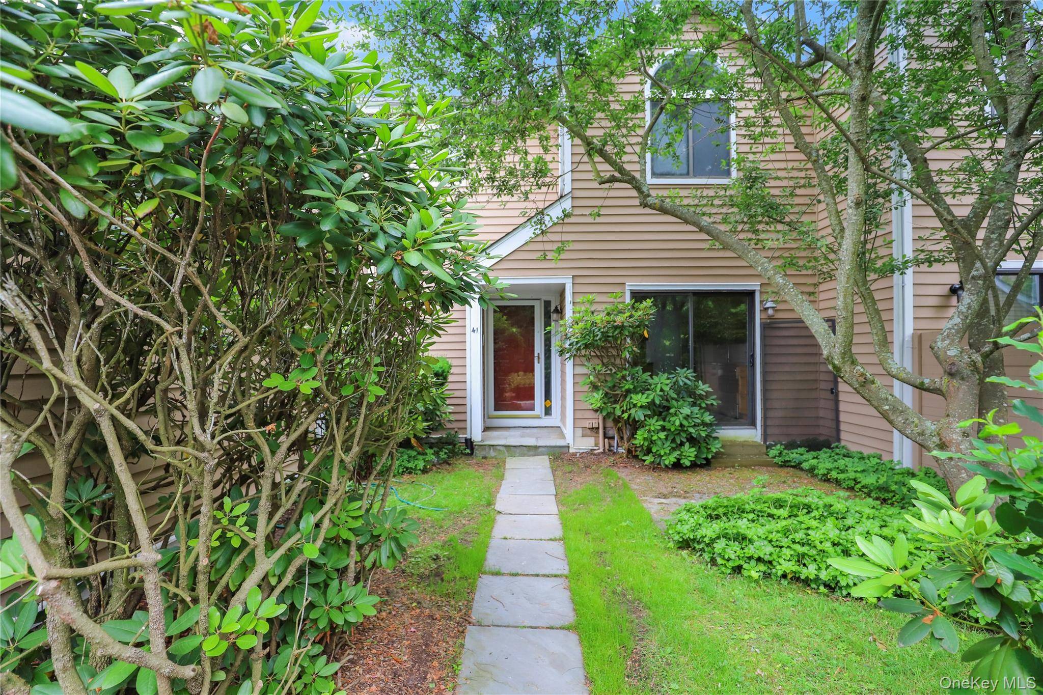 Updated 3 bedroom townhouse at Old Farm Lakes in Chappaqua, a beautiful renovated condo near everything.
