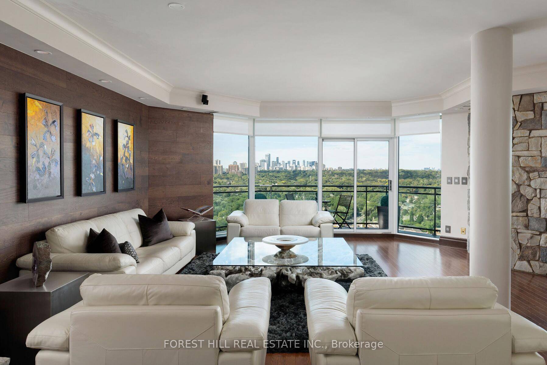 Framed by the endless green canopy of the Rosedale Ravine, this residence commands one of the most coveted vantage points in Toronto.