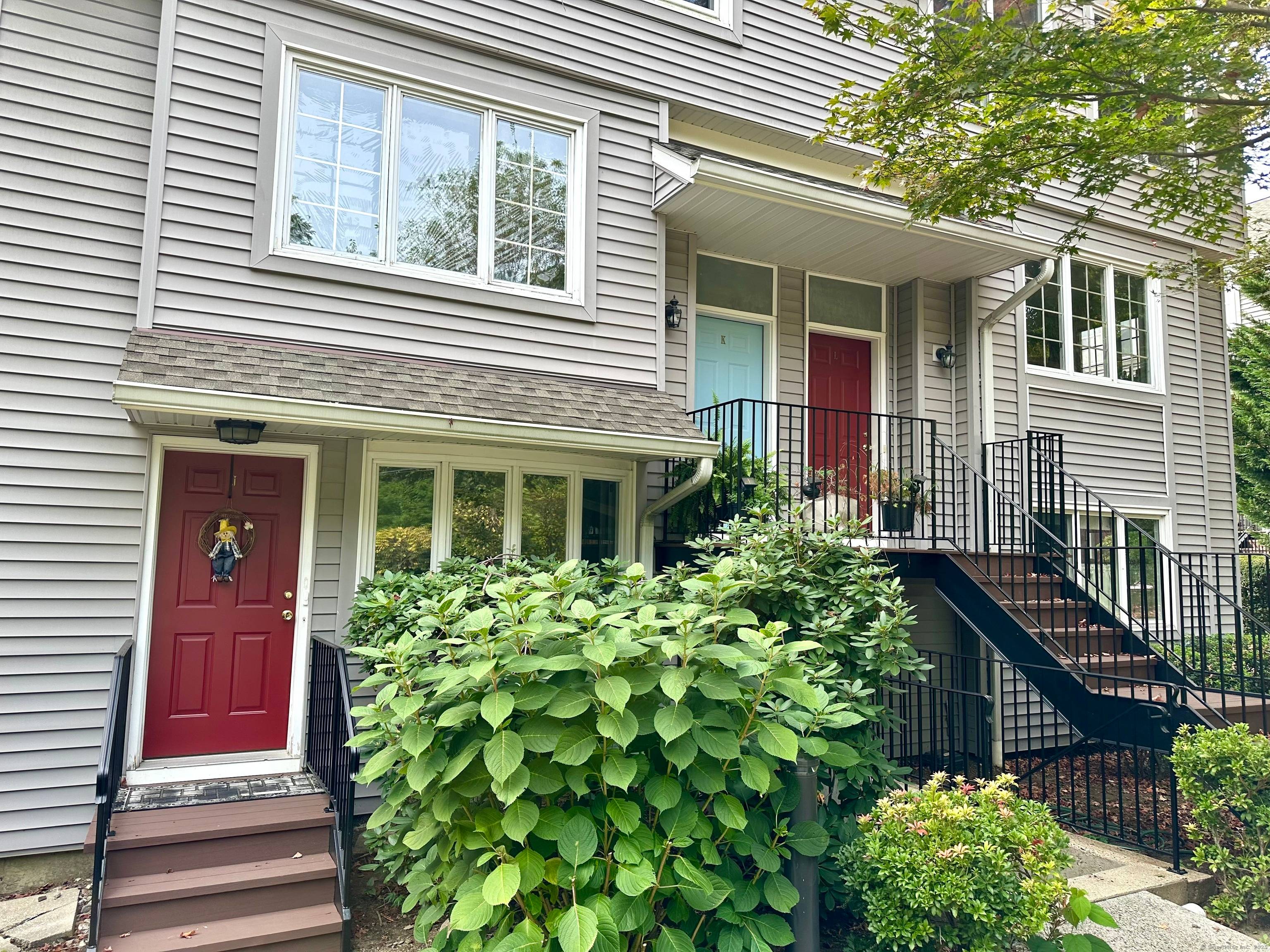 Lovely two bedroom ranch style condo with many appealing features hardwood floors, fireplace, central air, breakfast room off of the kitchen, balcony, lower level family room, a private storage room ...