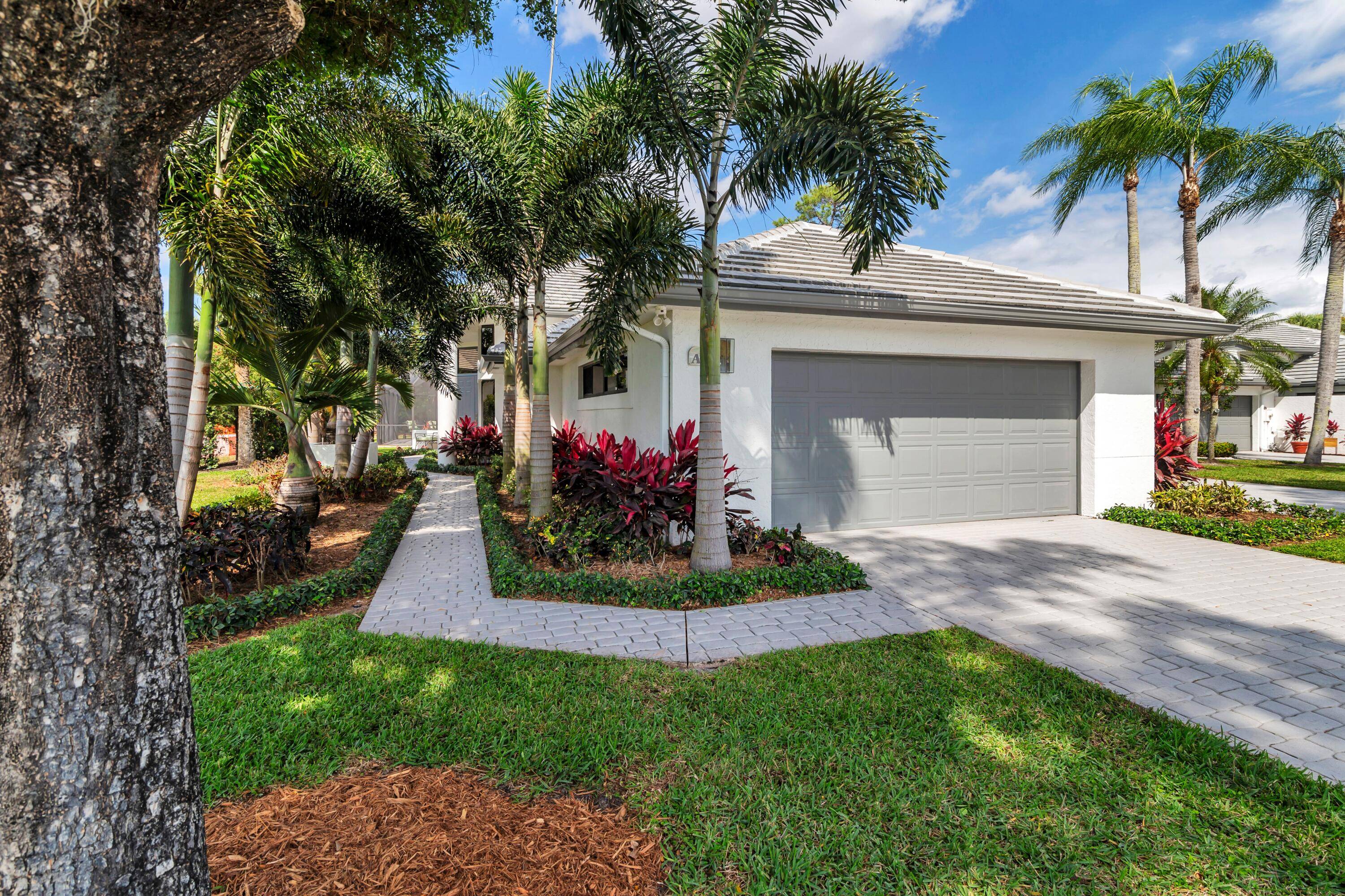 This fully renovated turn key corner villa offers high ceilings with natural light 3 oversized bedrooms and private views.