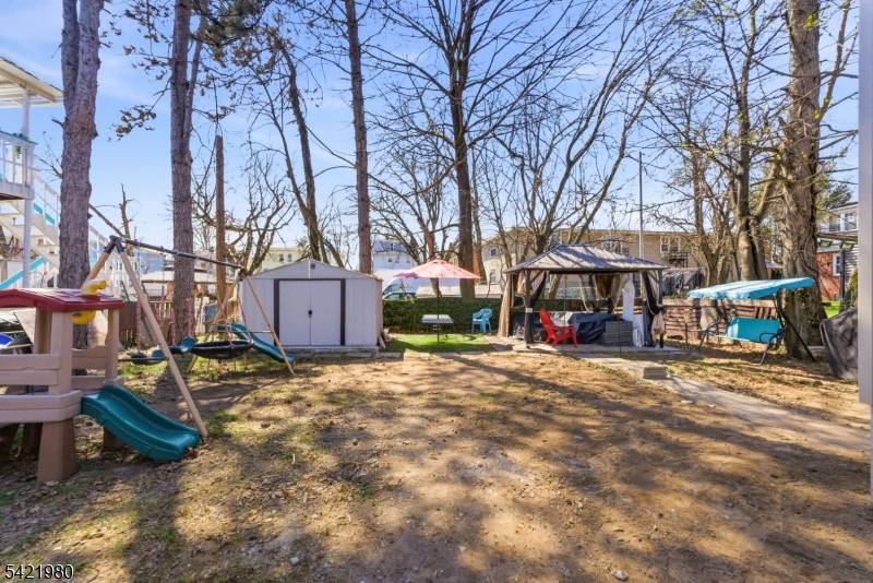 Directly across from a park offering scenic views and added privacy.