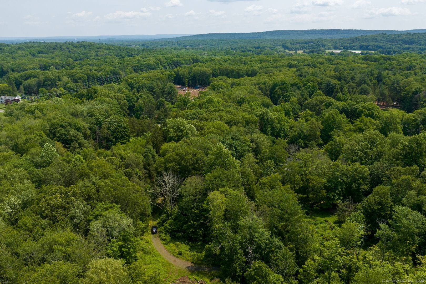 Discover an incredible opportunity with this expansive 58 acre parcel of land, perfect for your next residential development.
