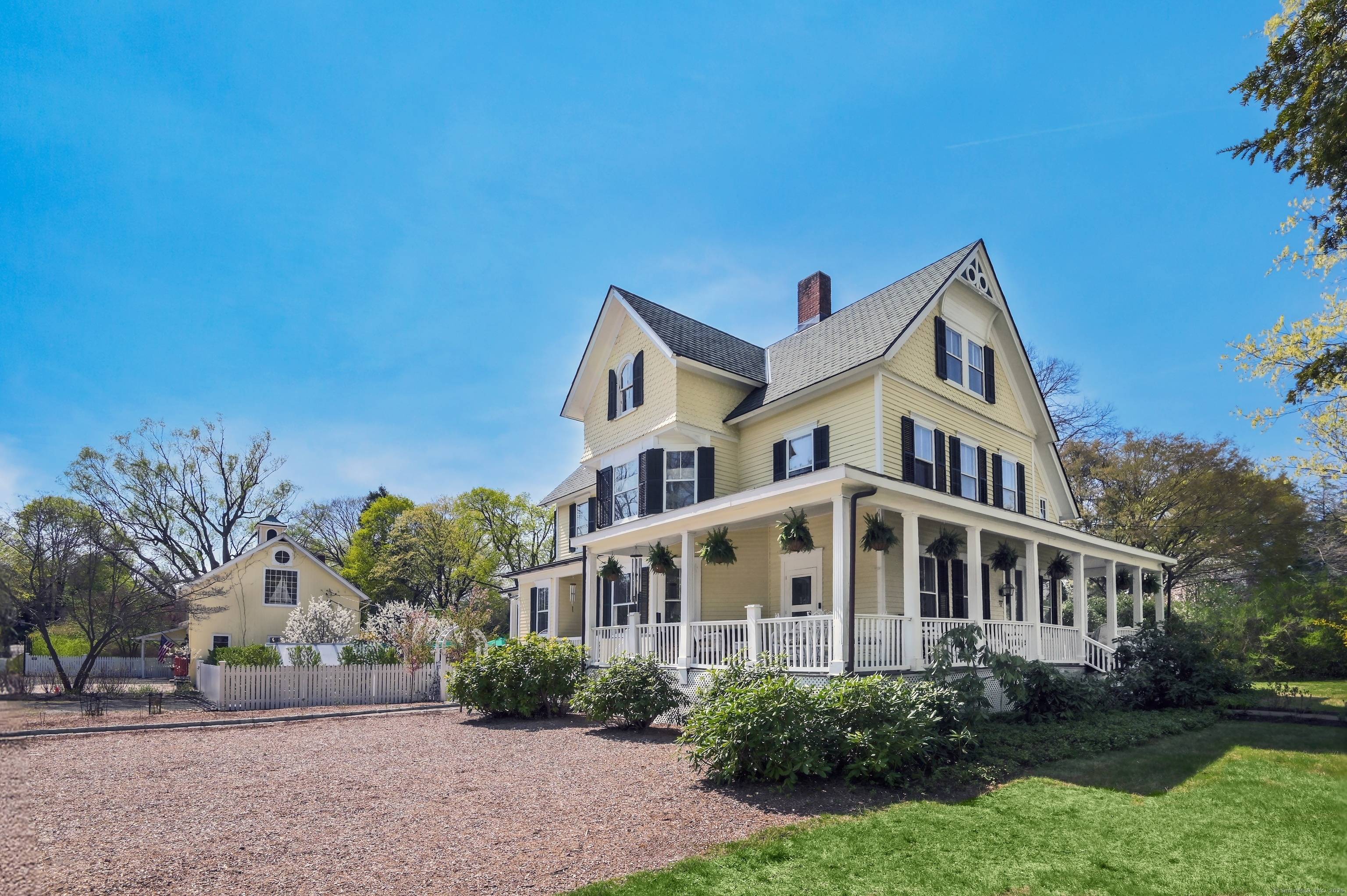 Welcome to a timeless gem at 57 Main Street, Ridgefield, CT.