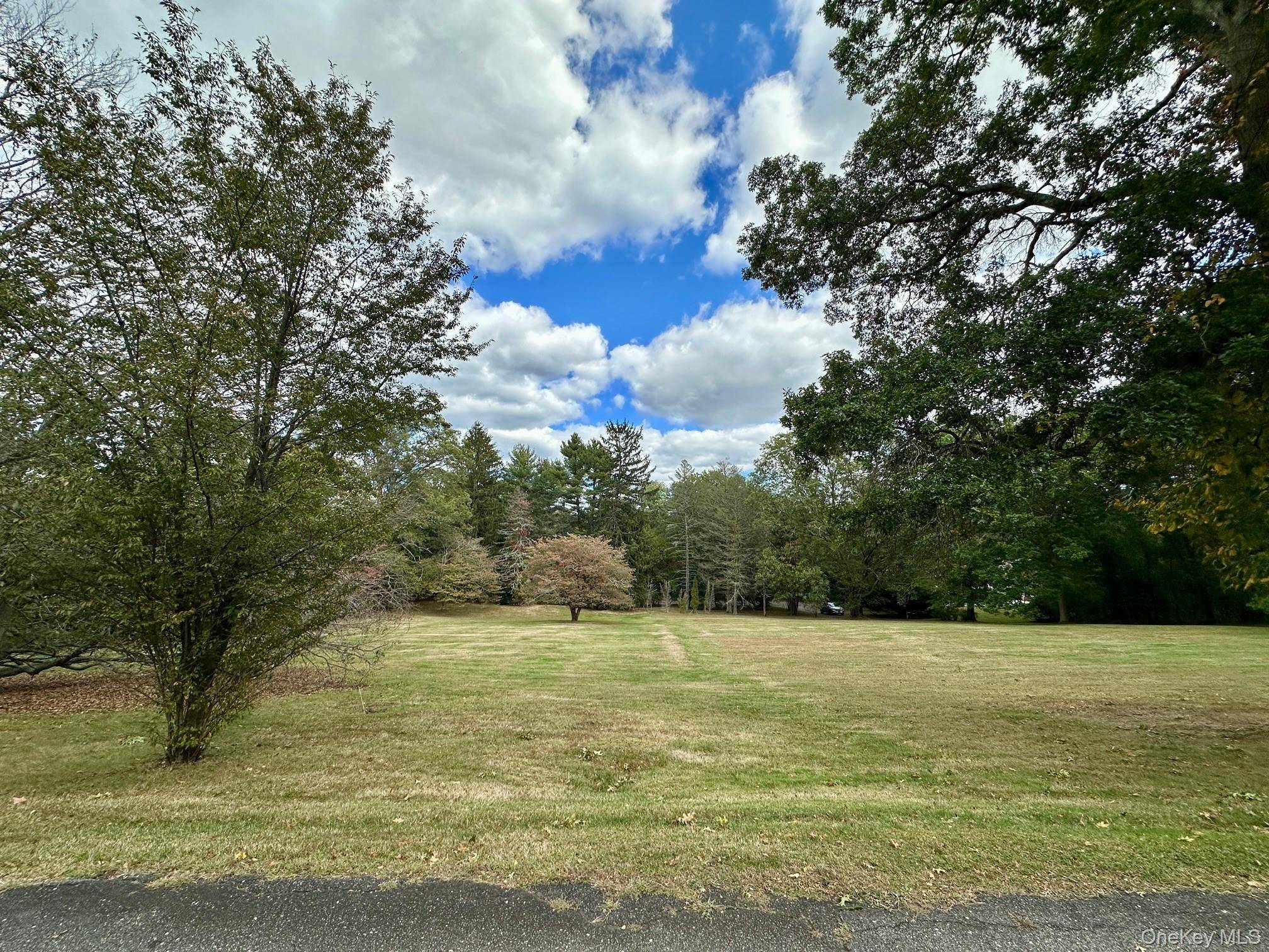 Build the home of your dreams on this gorgeous, improved parcel of land in the heart of Muttontown.
