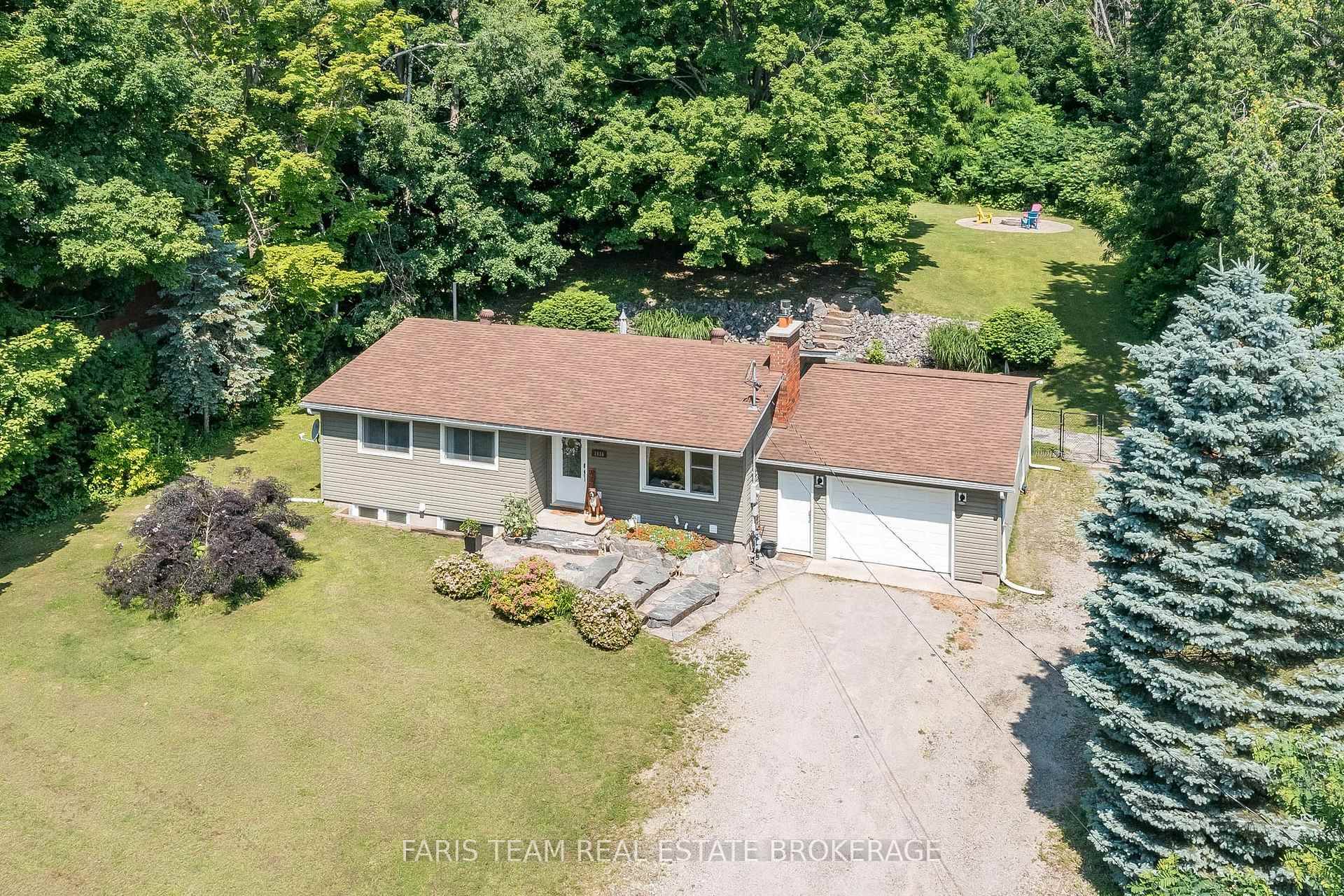 Top 5 Reasons You Will Love This Home 1 Stunningly renovated open concept bungalow featuring a spacious, modern kitchen with a large island, perfect for both cooking and entertaining, complemented ...