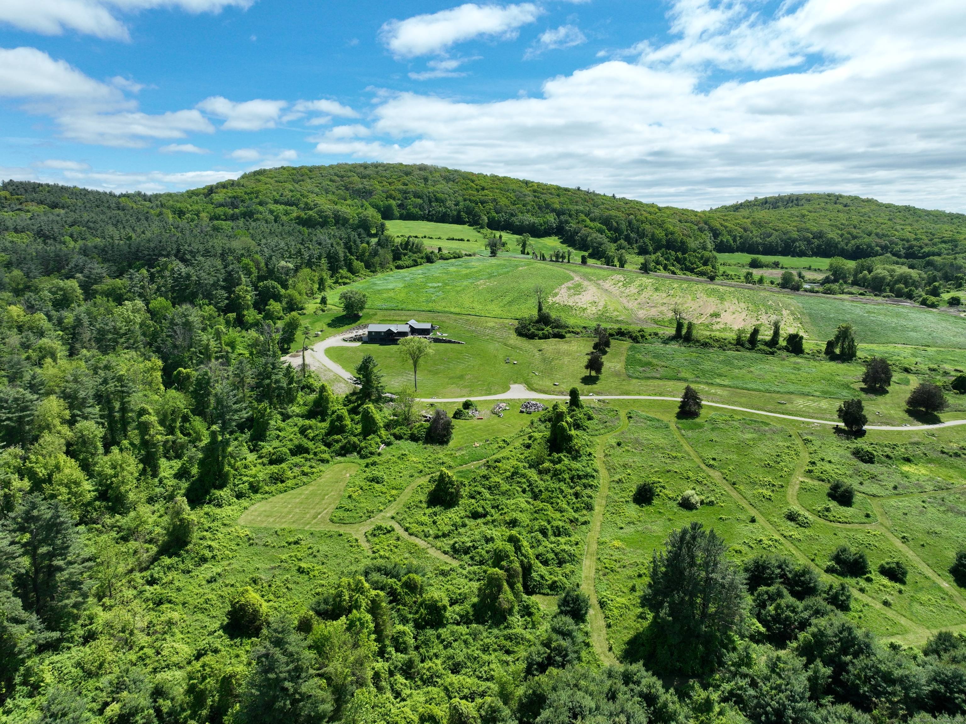 Nestled on a private road amid Salisbury's picturesque landscape, this 9.