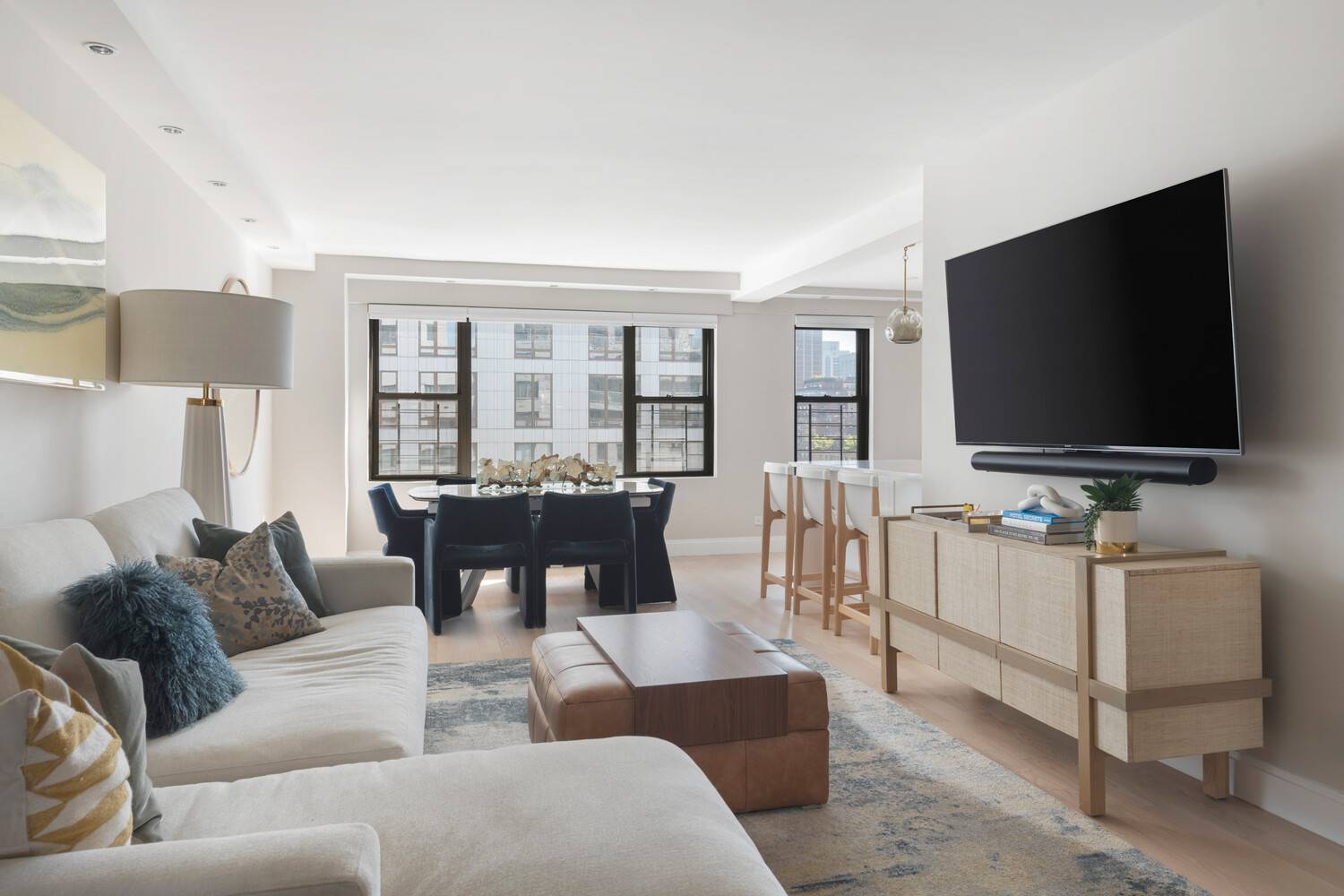 This turnkey two bedroom residence offers an open concept living and dining area with eastern views and blonde hardwood flooring throughout.