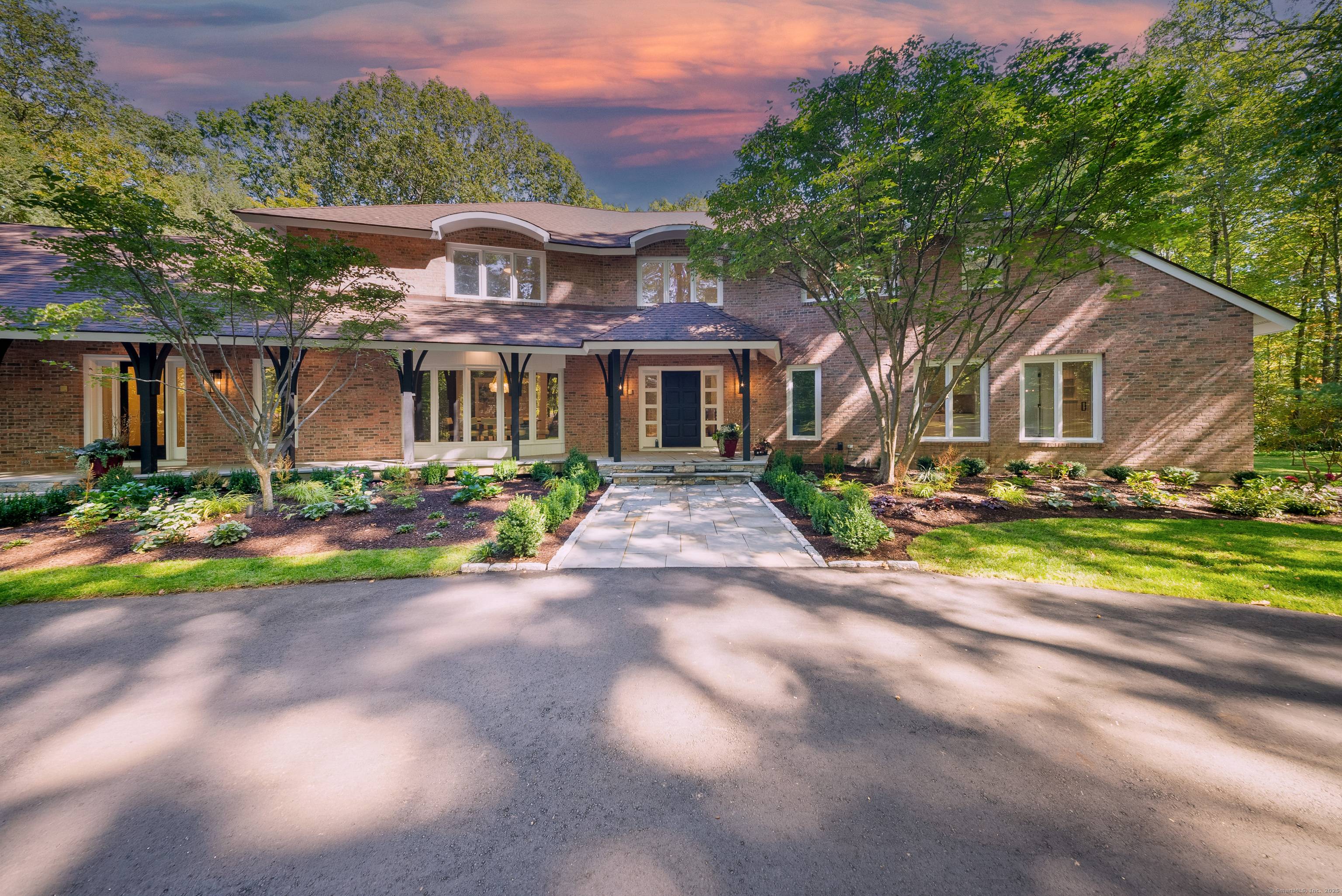 Set back from the street in the sought after Avonridge neighborhood, this 6000 sq ft luxury estate has undergone a modern renovation.