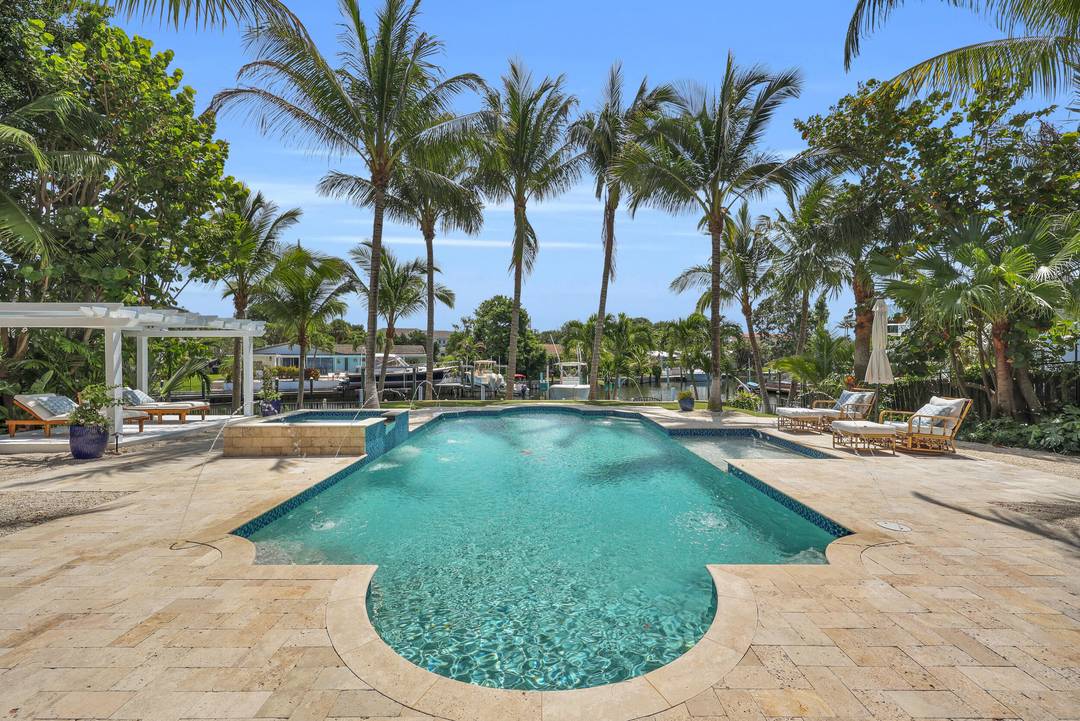 Welcome to your own private waterfront oasis in Paradise Point, where resort style living meets relaxed coastal elegance in the heart of Palm Beach Gardens.