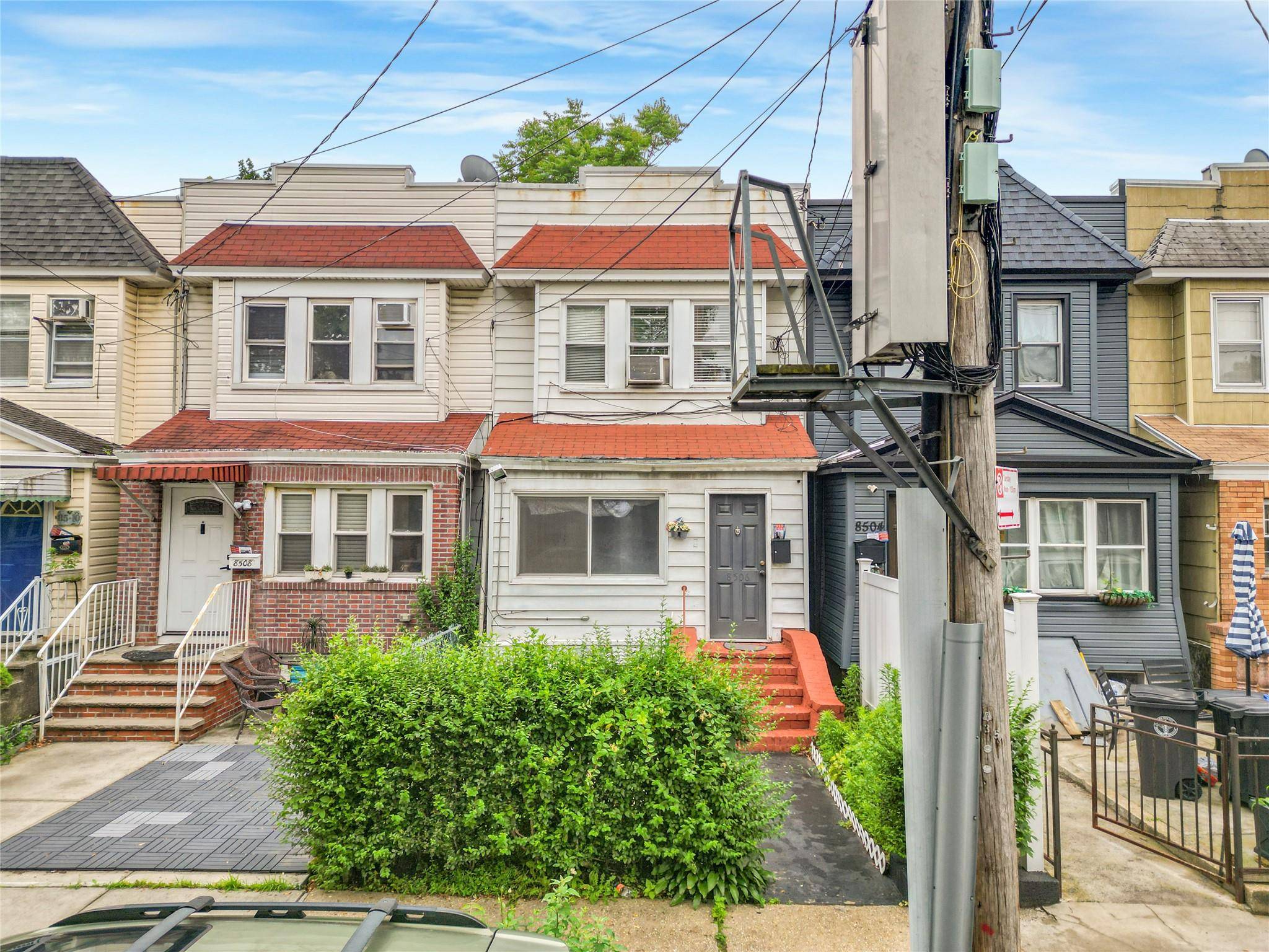 Welcome to 85 06 122nd Street, a well located two family home in the heart of Kew Gardens.