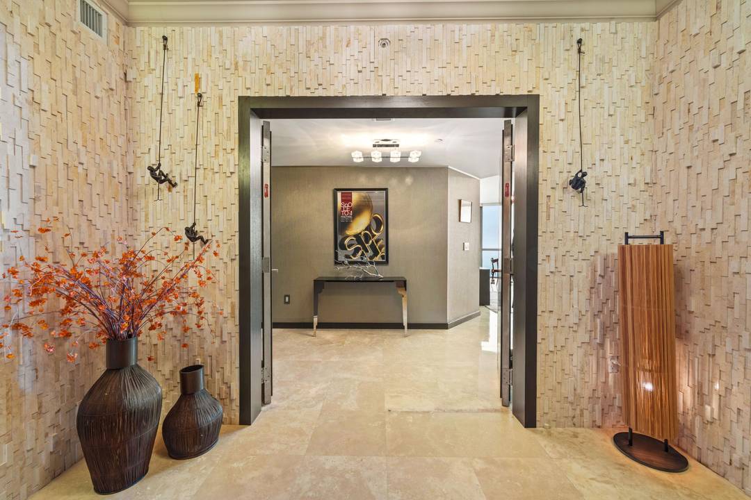 Imagine renting on the 31st floor of the Ocean Palms, in this custom designed furnished unit, where you have some ocean views for everyday living, stunning custom built ins, high ...