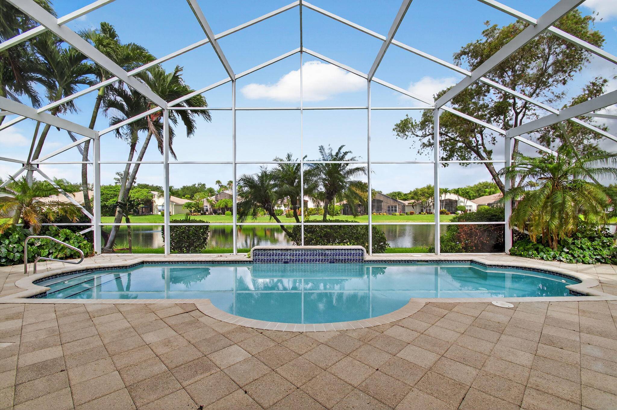 GORGEOUS PALMA MODEL ON THE WATER WITH SCREENED IN LARGE BEAUTIFUL POOL !