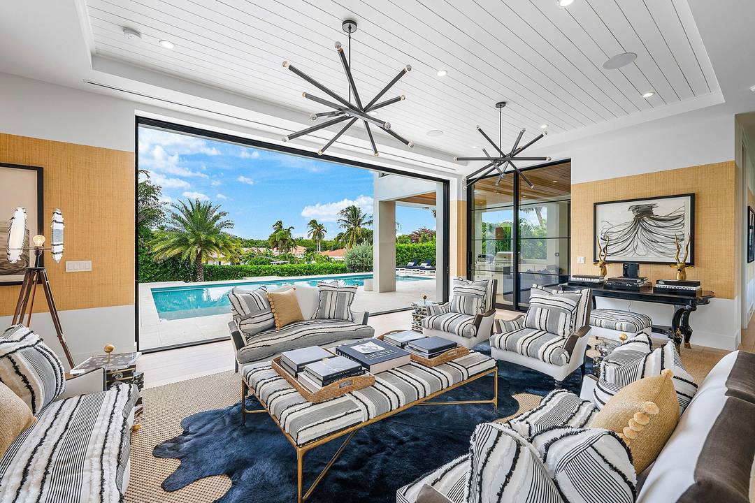 Welcome to 10 Harbour Drive S in Ocean Ridge, Florida an exclusive coastal enclave where quiet sophistication meets the very best of South Florida living.