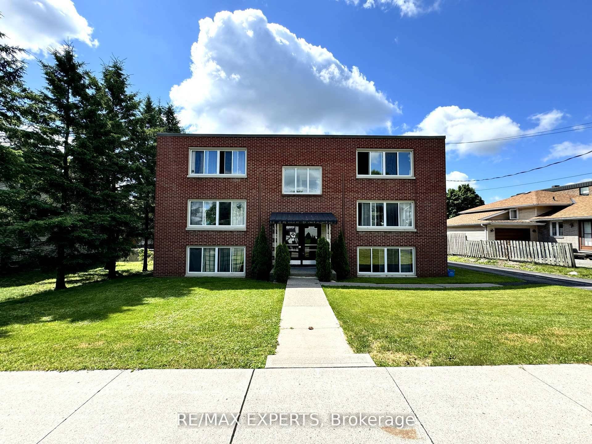 Available immediately, this spacious 2 bedroom, 1 bathroom ground level unit offers convenient parking and a private rear entrance from the kitchen to the parking lot.