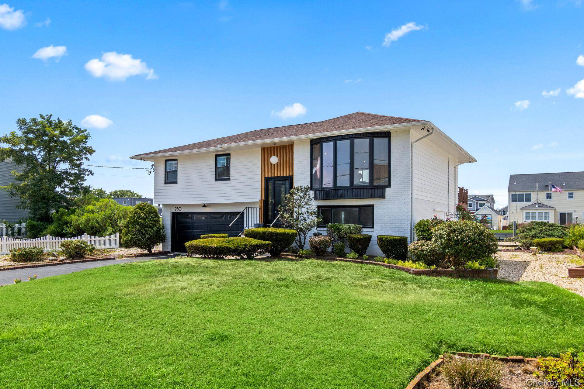 Beautifully updated 3 bedroom, 2 bath split level home in the highly sought after Sequams Colony.